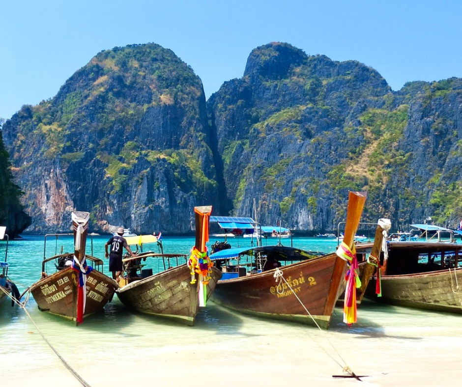 Row of Thai longtail boats